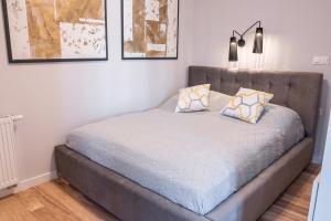 Łóżko lub łóżka w pokoju w obiekcie Apartamenty Targi