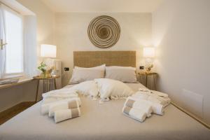 Ένα ή περισσότερα κρεβάτια σε δωμάτιο στο Residenza Europa