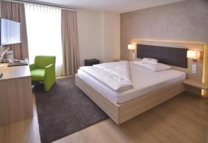 Postel nebo postele na pokoji v ubytování Hotel - Restaurant Hirsch