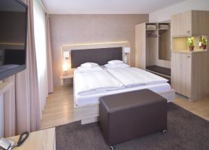 Postel nebo postele na pokoji v ubytování Hotel - Restaurant Hirsch