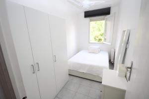 Postel nebo postele na pokoji v ubytování casa en Masnou junto a playa y tren