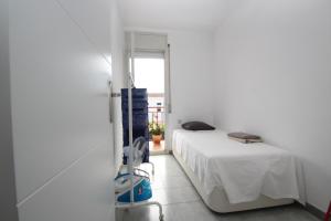 Postel nebo postele na pokoji v ubytování casa en Masnou junto a playa y tren