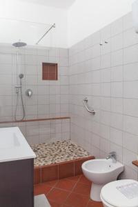 a bathroom with a shower and a toilet at Appartamento 122 in Prato