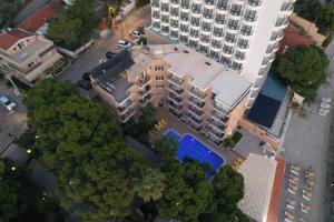 an overhead view of a city with buildings and trees at Melis Hotel Kusadasi in Kusadası