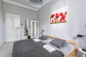 Posteľ alebo postele v izbe v ubytovaní Fenna Apartments 7 minut od Rynku