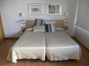 Postel nebo postele na pokoji v ubytování Dormavalencia Hostel
