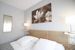 Postel nebo postele na pokoji v ubytování Dormavalencia Hostel