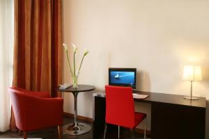 TV a/nebo společenská místnost v ubytování Hotel San Clemente