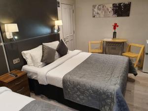 Postel nebo postele na pokoji v ubytování W6 Hotel