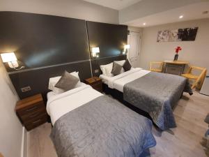 Postel nebo postele na pokoji v ubytování W6 Hotel