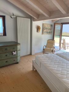 Postel nebo postele na pokoji v ubytování Villa Elma