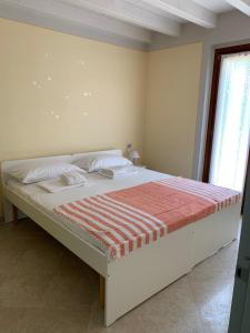 Postel nebo postele na pokoji v ubytování Villa Elma