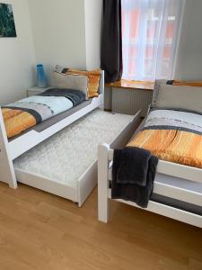 Voodi või voodid majutusasutuse Haus zur Eiche Private 3,5 Zimmerwohnung bis zu 8 Gäste toas