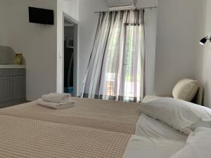 Posteľ alebo postele v izbe v ubytovaní Deep Blue Rooms & Apartments