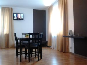 Telewizja i/lub zestaw kina domowego w obiekcie Gościniec Margo