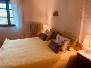 Postel nebo postele na pokoji v ubytování Le Castel Blanc