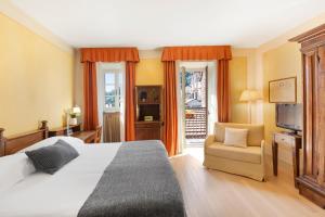 Postel nebo postele na pokoji v ubytování Hotel Pironi