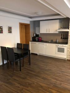 Küche/Küchenzeile in der Unterkunft Apartment Roxheim