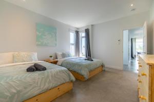 Postel nebo postele na pokoji v ubytování Hôtel-Appartements de la Gare