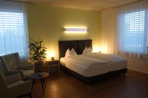 Postel nebo postele na pokoji v ubytování Partner Hotel AG Zofingen