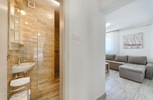 Koupelna v ubytování Apartmani MARINA + 37 fotografií