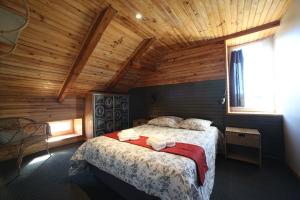 Säng eller sängar i ett rum på La Maison des Champs