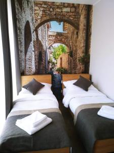 Cama o camas de una habitación en Dom Weselny Ludmiła