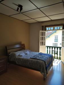 A bed or beds in a room at Apartamento Duplex no melhor bairro de NF