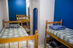 Кровать или кровати в номере Paradise Hostel Ilha Grande