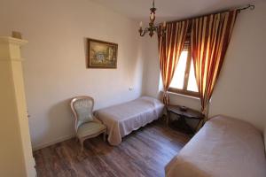 Postel nebo postele na pokoji v ubytování Ciao Verona Bed and Kitchen