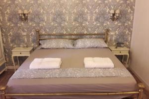 Postel nebo postele na pokoji v ubytování Ciao Verona Bed and Kitchen