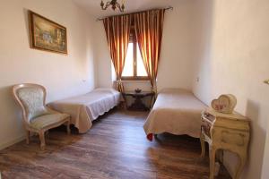 Postel nebo postele na pokoji v ubytování Ciao Verona Bed and Kitchen