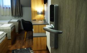 Postel nebo postele na pokoji v ubytování Dolce Vita Panzió