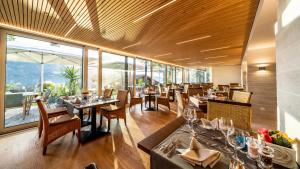 Restoran või mõni muu söögikoht majutusasutuses Villa Postillion am See
