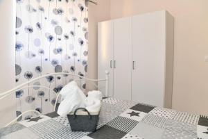 Posteľ alebo postele v izbe v ubytovaní Sofie's Port View Apartment