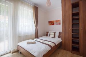 Posteľ alebo postele v izbe v ubytovaní Diana Apartments Karlovy Vary