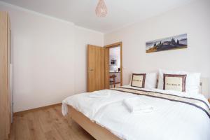 Posteľ alebo postele v izbe v ubytovaní Diana Apartments Karlovy Vary