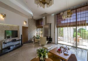TV a/nebo společenská místnost v ubytování SunRay Resort&Spa