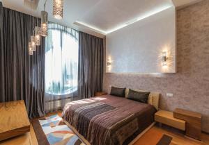 Postel nebo postele na pokoji v ubytování SunRay Resort&Spa