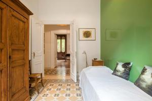Letto o letti in una camera di Flat Three