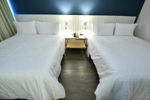 Voodi või voodid majutusasutuse Holiday Inn Express Asuncion Aviadores by IHG toas