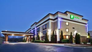 a hotel with a sign that reads hotel rooms at Holiday Inn Express Peachtree Corners-Norcross, an IHG Hotel in Norcross