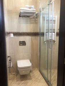 Koupelna v ubytování Neapol Boutique Hotel