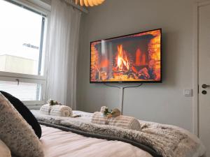 TV a/nebo společenská místnost v ubytování Hostit cozy apartment