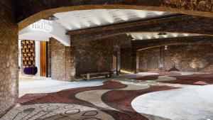 a room with a carpet on the floor at Hotel Indigo Guanajuato, an IHG Hotel in Guanajuato