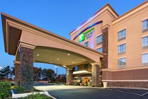 a hotel building with a sign on it at Holiday Inn Express & Suites Cookeville, an IHG Hotel in Cookeville