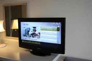 TV a/nebo společenská místnost v ubytování Kawagoe Prince Hotel