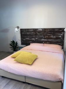 Postel nebo postele na pokoji v ubytování B&B MonteCengio