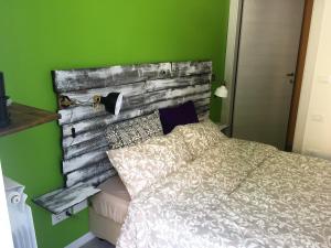 Postel nebo postele na pokoji v ubytování B&B MonteCengio