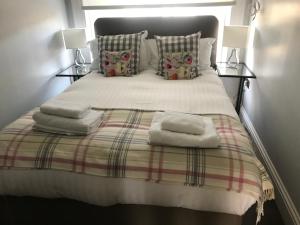 Katil atau katil-katil dalam bilik di Stramongate Apartment